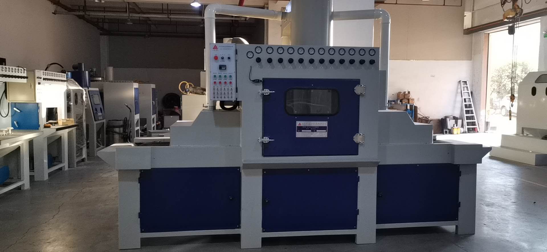 輸送式自動噴砂機